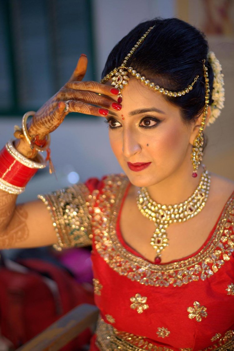 Crimson Red Blouse With Golden Gold patti And Flower Design by Arpit Gulati Bridal-makeup Bridal-jewellery-and-accessories | Weddings Photos & Ideas