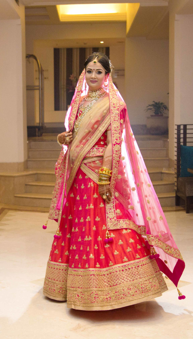 Rajasthani Bride Wearing Pink Lehenga With Golden Embroidery by Arpit Gulati Wedding-photography Wedding-dresses | Weddings Photos & Ideas