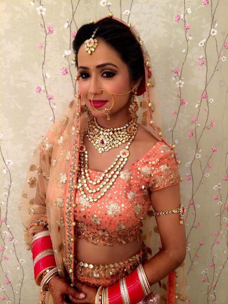 Loved the color of her dress! by Pooja Sethi Bridal-makeup | Weddings Photos & Ideas