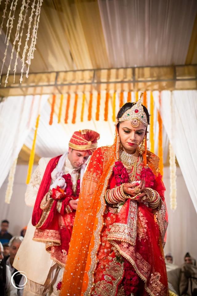 Amidst Ritual proceedings by Amish Photography Wedding-photography | Weddings Photos & Ideas