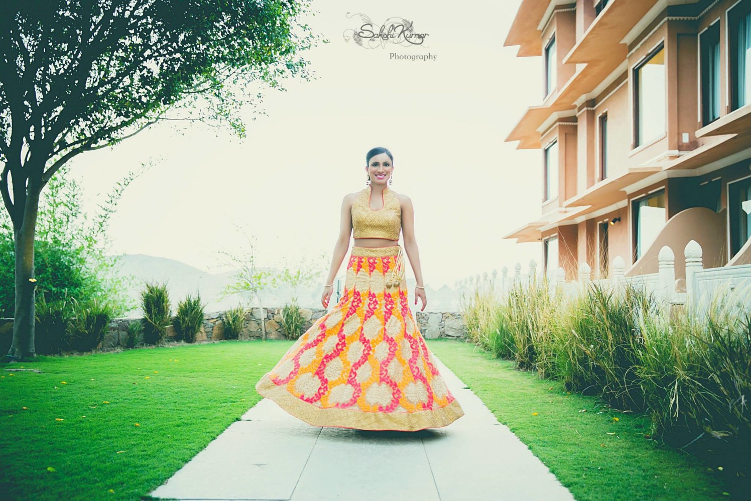 Blossoms In Orange And Pink Mermaid Lehenga With Golden Thread-Work And Collar Neck Sleeveless Blouse by Sakshi Kumar Wedding-photography Wedding-dresses | Weddings Photos & Ideas