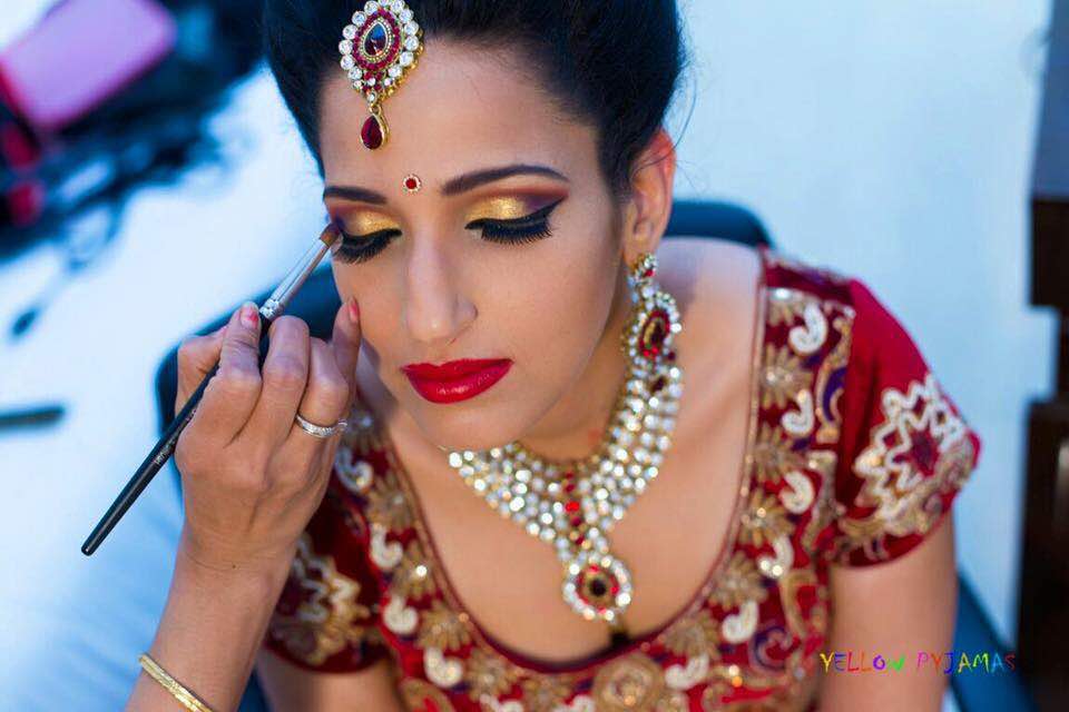 Copper eye shadow and light makeup by Richa Malik Bridal-makeup | Weddings Photos & Ideas