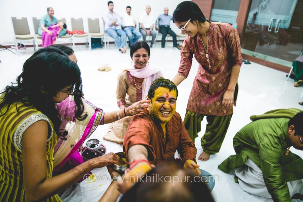 Haldi ceremony in full swing by Nikhil Kapur Photography Wedding-photography | Weddings Photos & Ideas