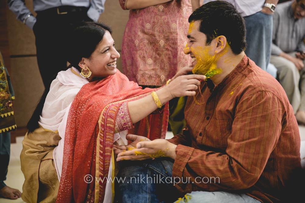 Haldi ceremony in full swing by Nikhil Kapur Photography Wedding-photography | Weddings Photos & Ideas