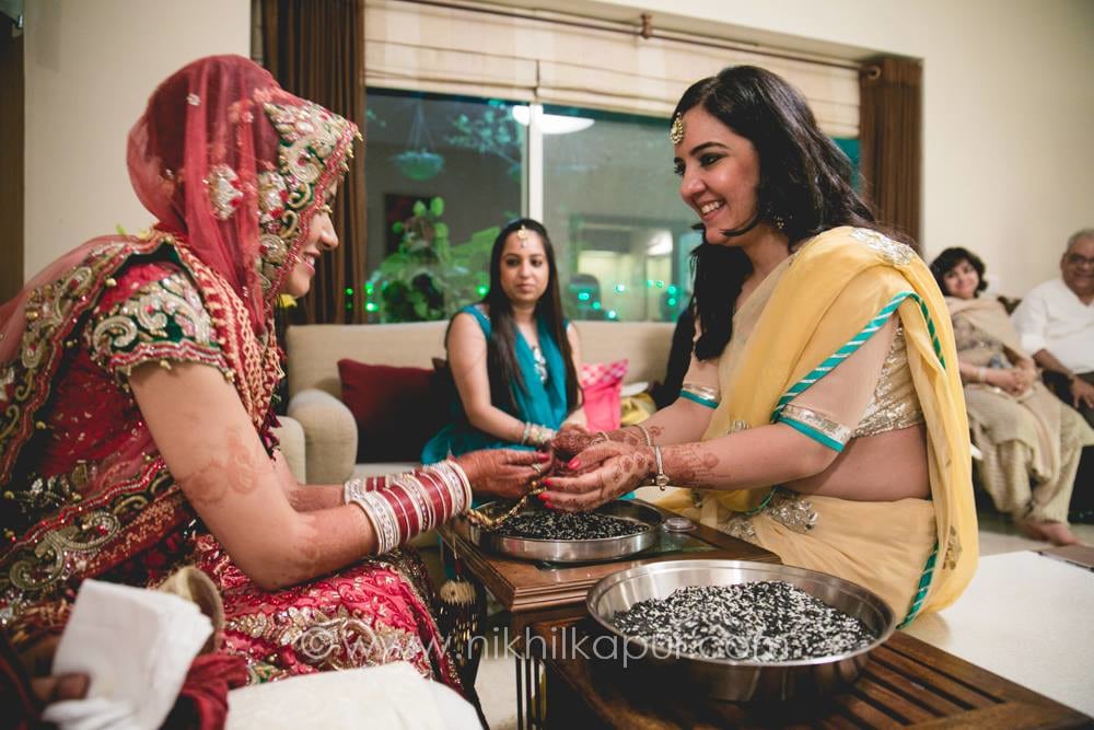 The rasams begin by Nikhil Kapur Photography Wedding-photography | Weddings Photos & Ideas