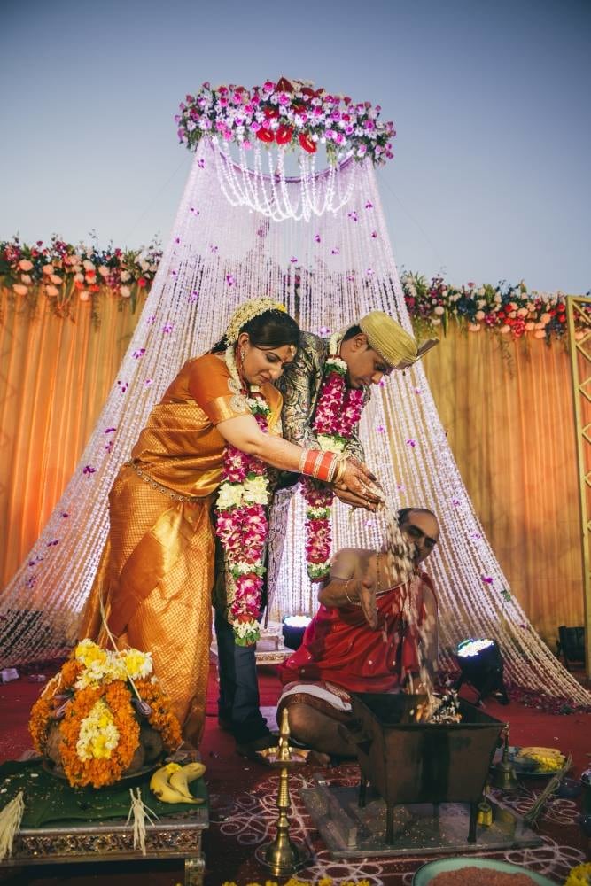 The couple embraces the ceremony by Nikhil Kapur Photography Wedding-photography | Weddings Photos & Ideas