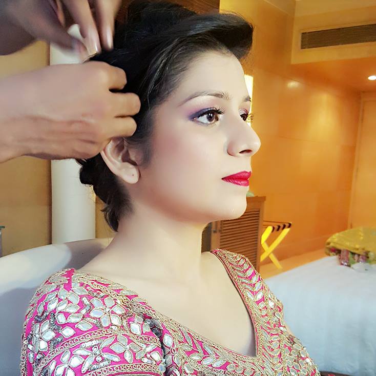 Bride getting ready by Nishi Singh Bridal-makeup | Weddings Photos & Ideas