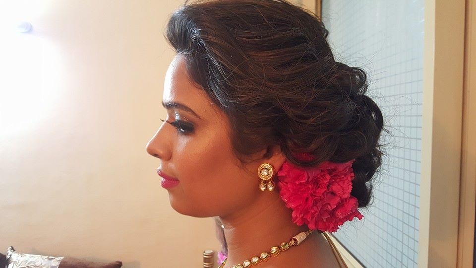 Not going for just any simple hairdo by Nishi Singh Bridal-makeup | Weddings Photos & Ideas