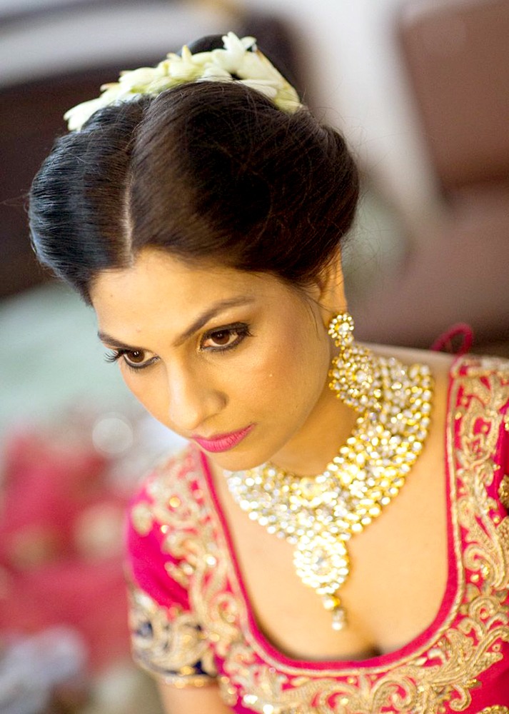 Candid shot of a bride by Nishi Singh Bridal-makeup | Weddings Photos & Ideas
