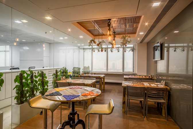 Office cafeteria with wooden flooring by Every Inch Modern | Interior Design Photos & Ideas
