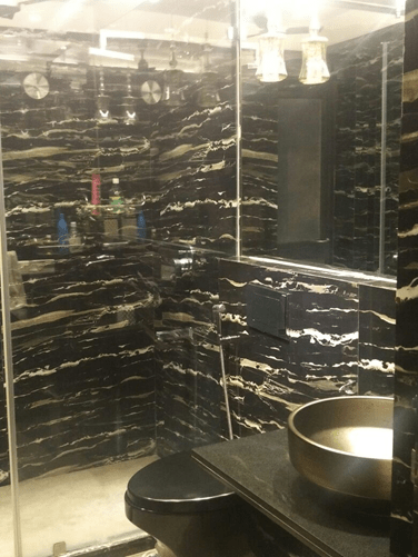 A modern black bathroom by Every Inch Bathroom Modern | Interior Design Photos & Ideas