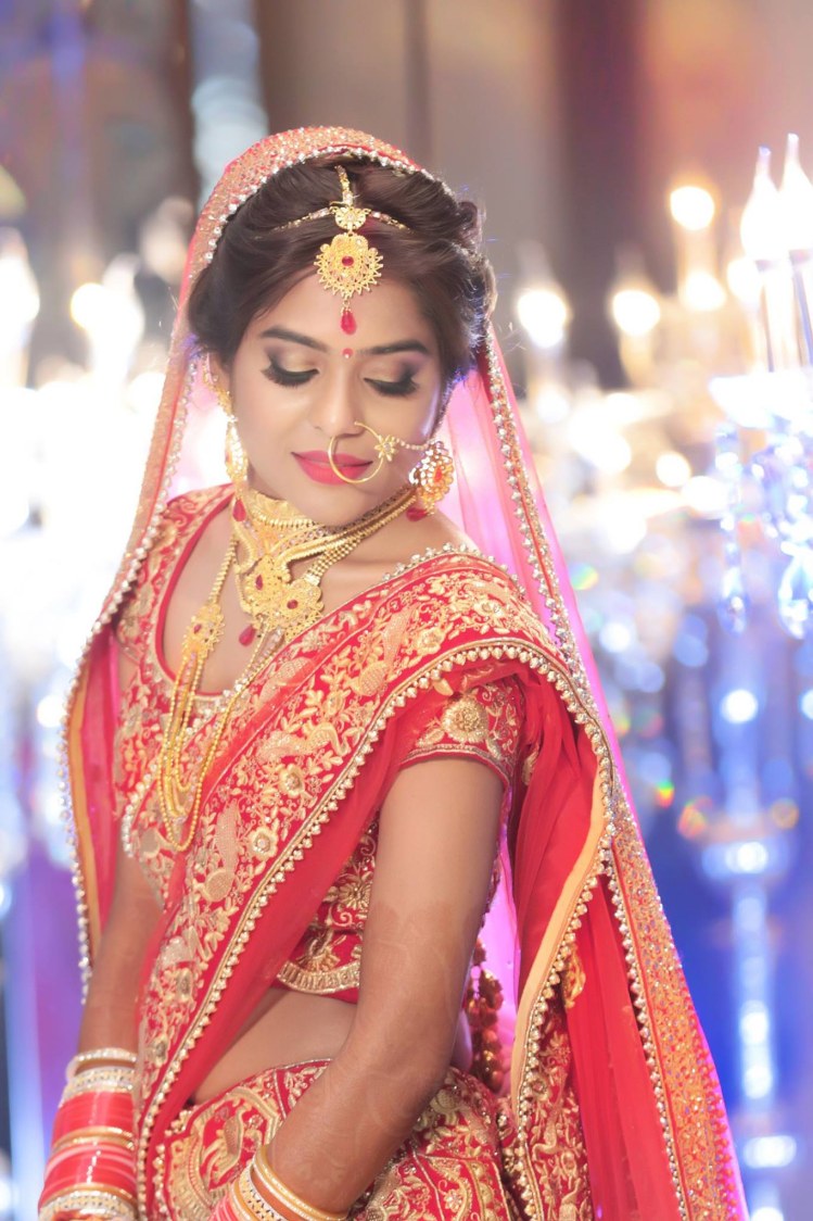 Bride Wearing Stunning Crimson Lehenga by Mukesh bijalwan Bridal-jewellery-and-accessories Wedding-photography Wedding-dresses Bridal-makeup | Weddings Photos & Ideas