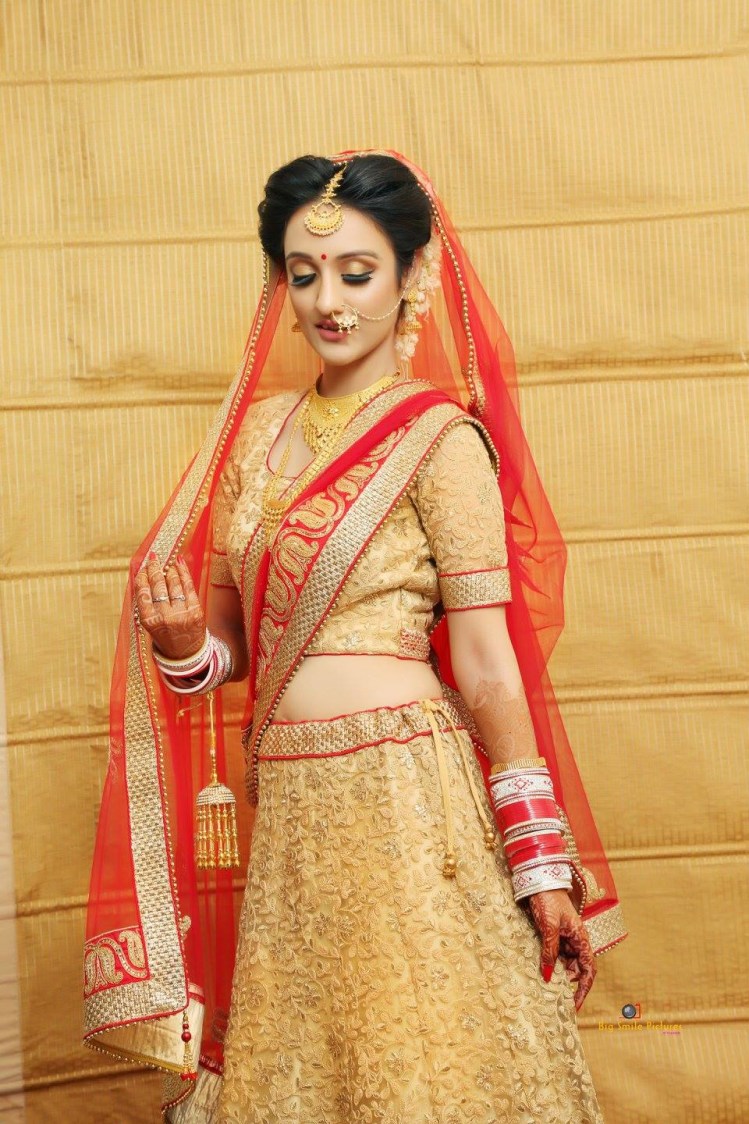 Bride Wearing A Delicately Embroidered Bridal Lehenga by Mukesh bijalwan Bridal-makeup Wedding-dresses | Weddings Photos & Ideas