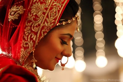 Candid shot of a bride by Sonam Jayna Bridal-makeup | Weddings Photos & Ideas