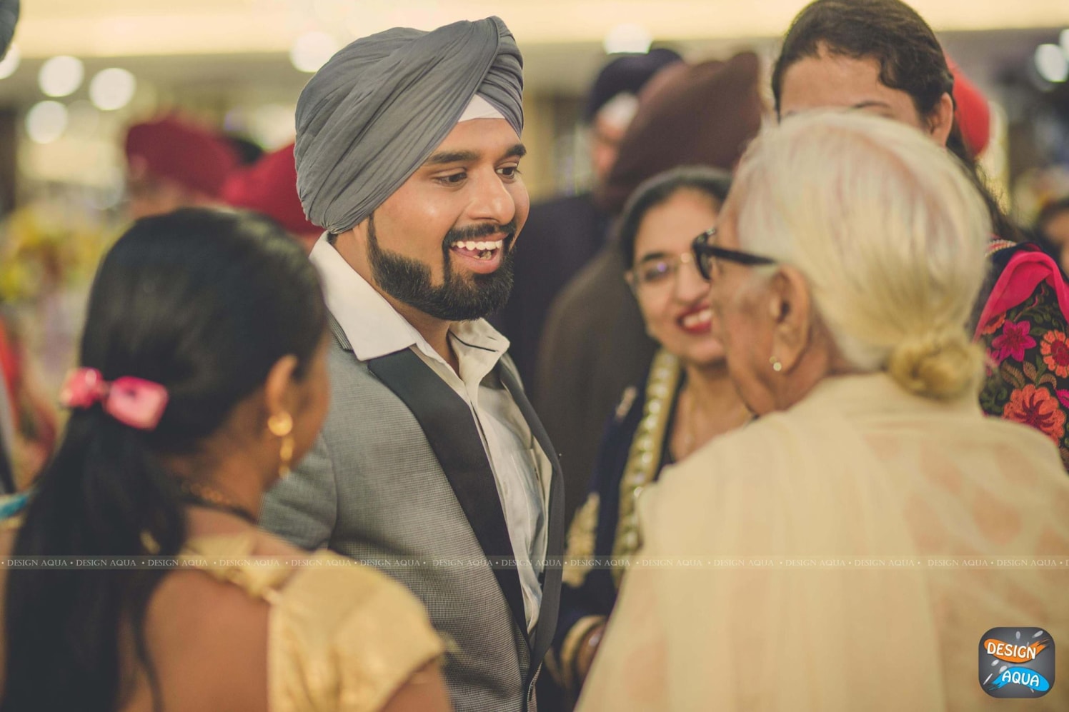 Jovial groom by Design Aqua