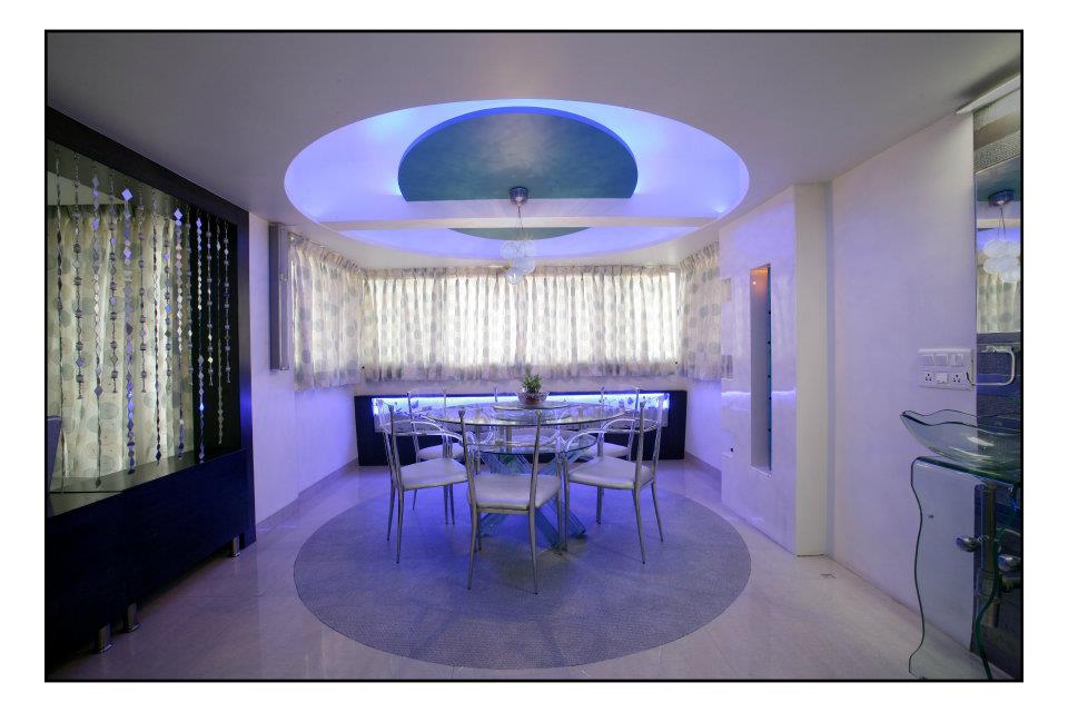 Spacious dinning area with blue neon lights by Hemangi Chaudhari-pawar Dining-room Minimalistic | Interior Design Photos & Ideas