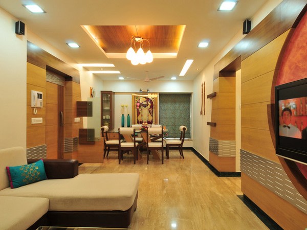 Spacious dinning space with wooden flooring and false ceiling by Hemangi Chaudhari-pawar Indoor-spaces Contemporary | Interior Design Photos & Ideas