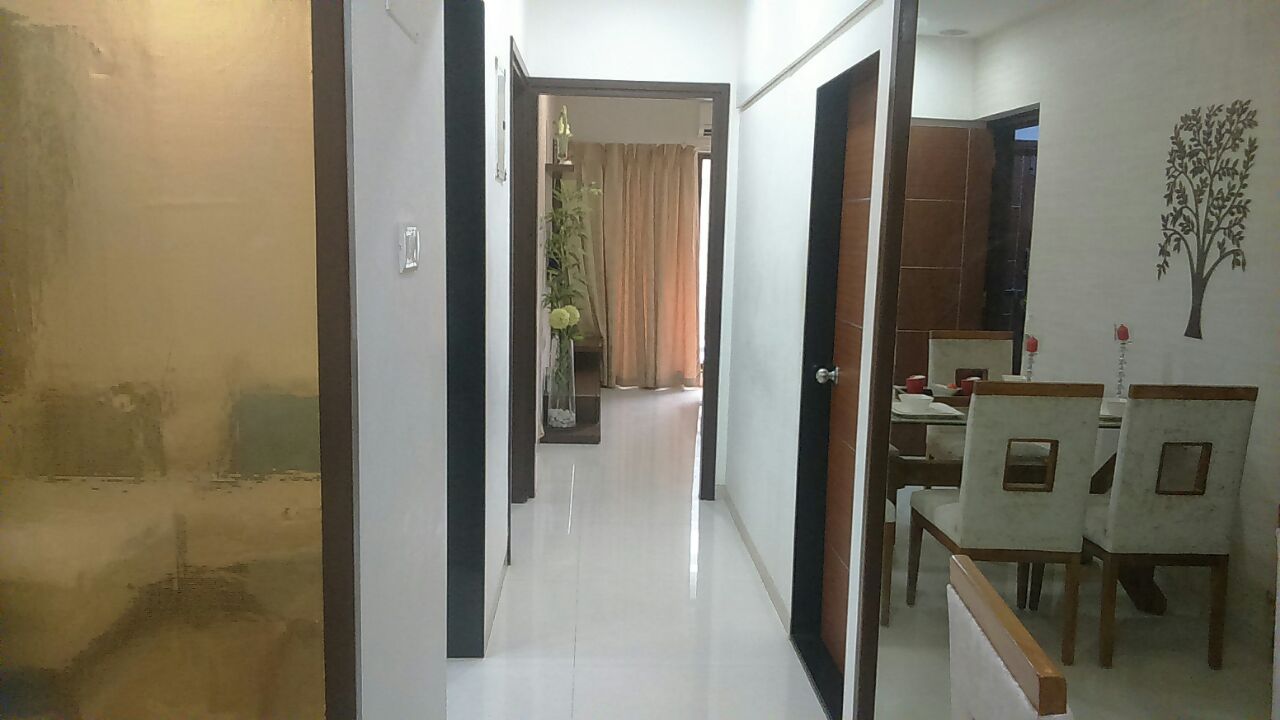 Hallway with marble flooring by Hemangi Chaudhari-pawar Indoor-spaces Modern | Interior Design Photos & Ideas