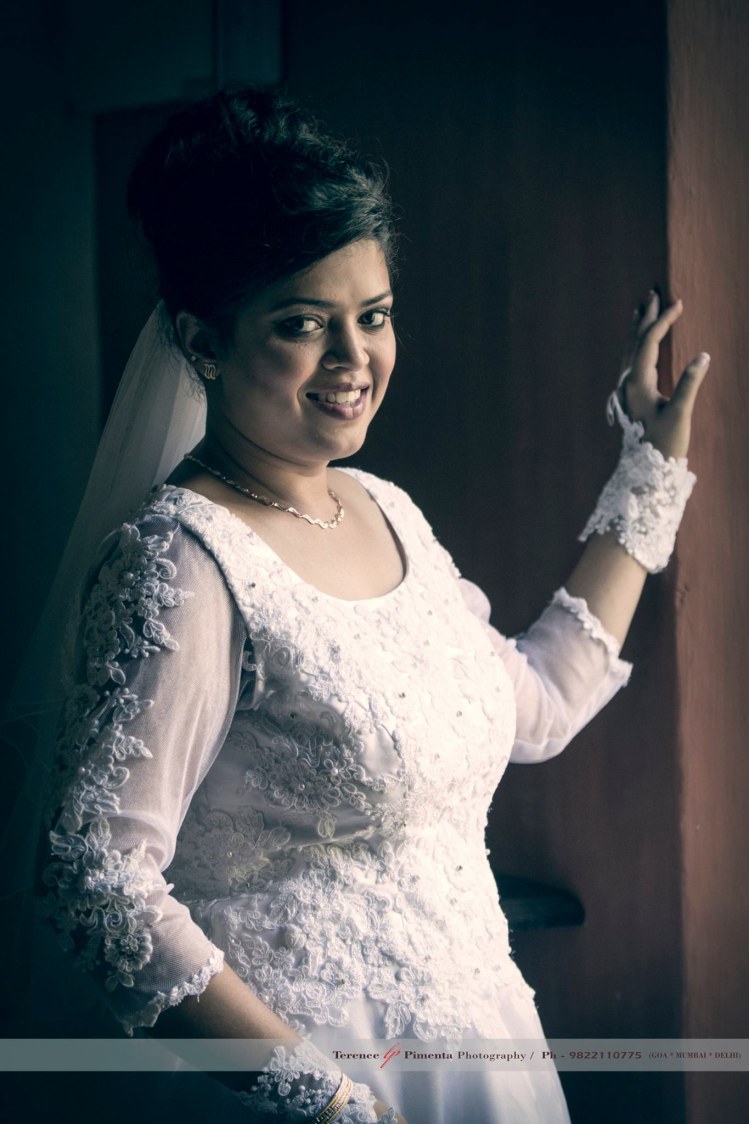 Side Shot Of Elegant Christian Bride In Gorgeous White Gown by Terence Savio Pimenta Wedding-photography | Weddings Photos & Ideas