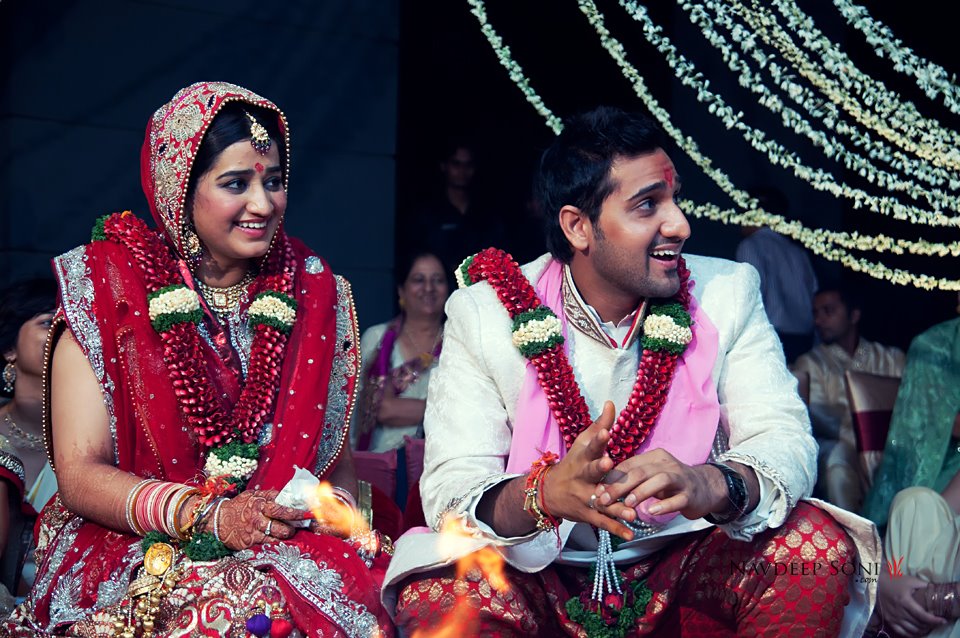Candid Shot Of Merry Bride And Groom During Their Wedding Ceremony by Navdeep Soni Wedding-photography | Weddings Photos & Ideas