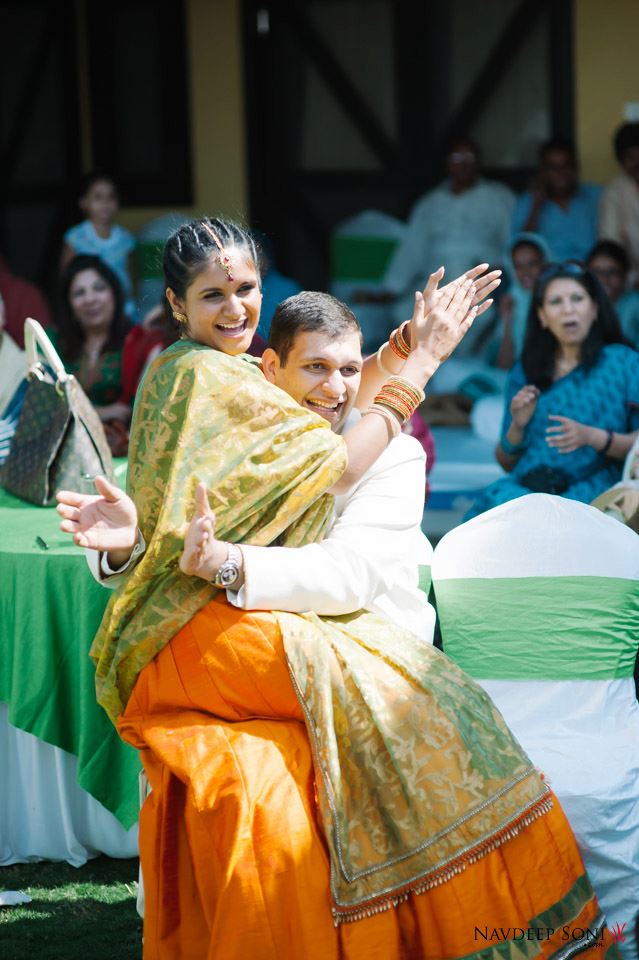 Candid Shot Of A Fun Loving Bride And Groom During Mehendi Ceremony by Navdeep Soni Wedding-photography | Weddings Photos & Ideas