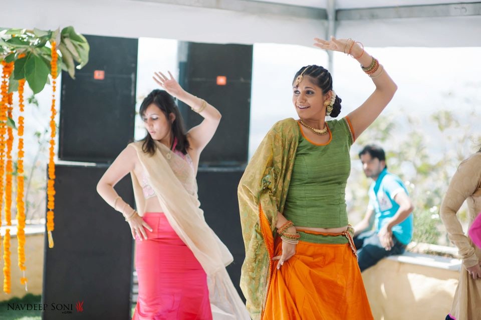 Candid Shot Of Bride Dancing With Her Maid Of Honor During Mehendi Ceremony by Navdeep Soni Wedding-photography | Weddings Photos & Ideas