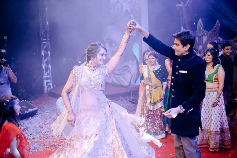 Captivating Sight Of Bride Twirling On Stage by Navdeep Soni Wedding-photography | Weddings Photos & Ideas