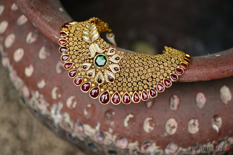 Eye Catching Gold Detailed Necklace Embedded With Red And Green Gemstones by Navdeep Soni Wedding-photography Bridal-jewellery-and-accessories | Weddings Photos & Ideas