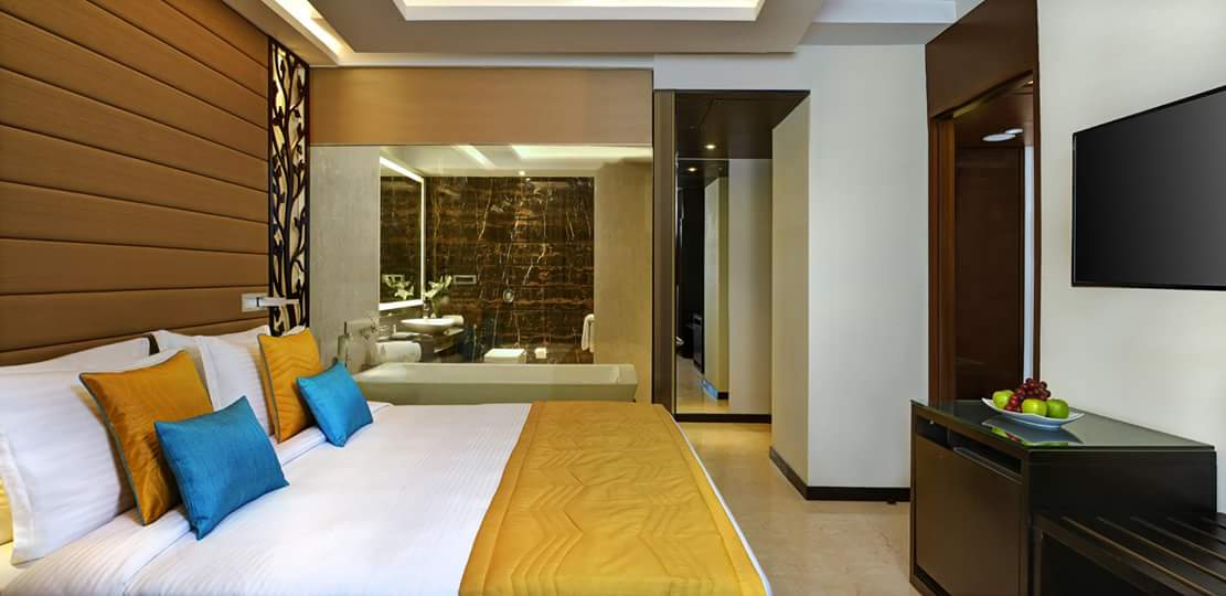 Bedroom With Brick Like Wooden Tiles by R. Gautam Jain Bedroom Contemporary | Interior Design Photos & Ideas