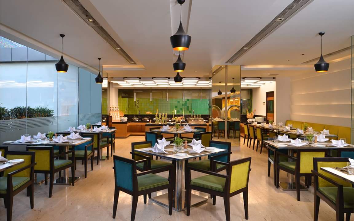 Restaurant With Green Chairs by R. Gautam Jain Contemporary | Interior Design Photos & Ideas