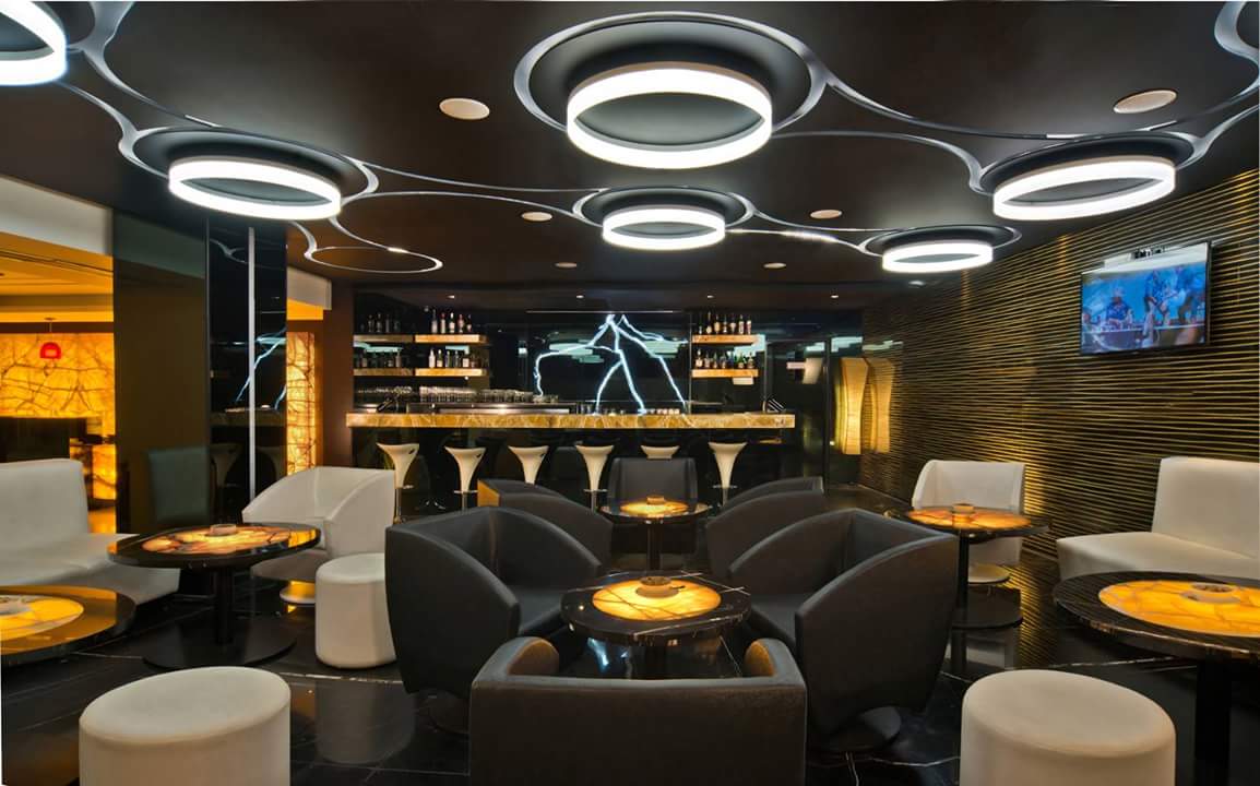 Bar With Brown Sofas by R. Gautam Jain Contemporary | Interior Design Photos & Ideas