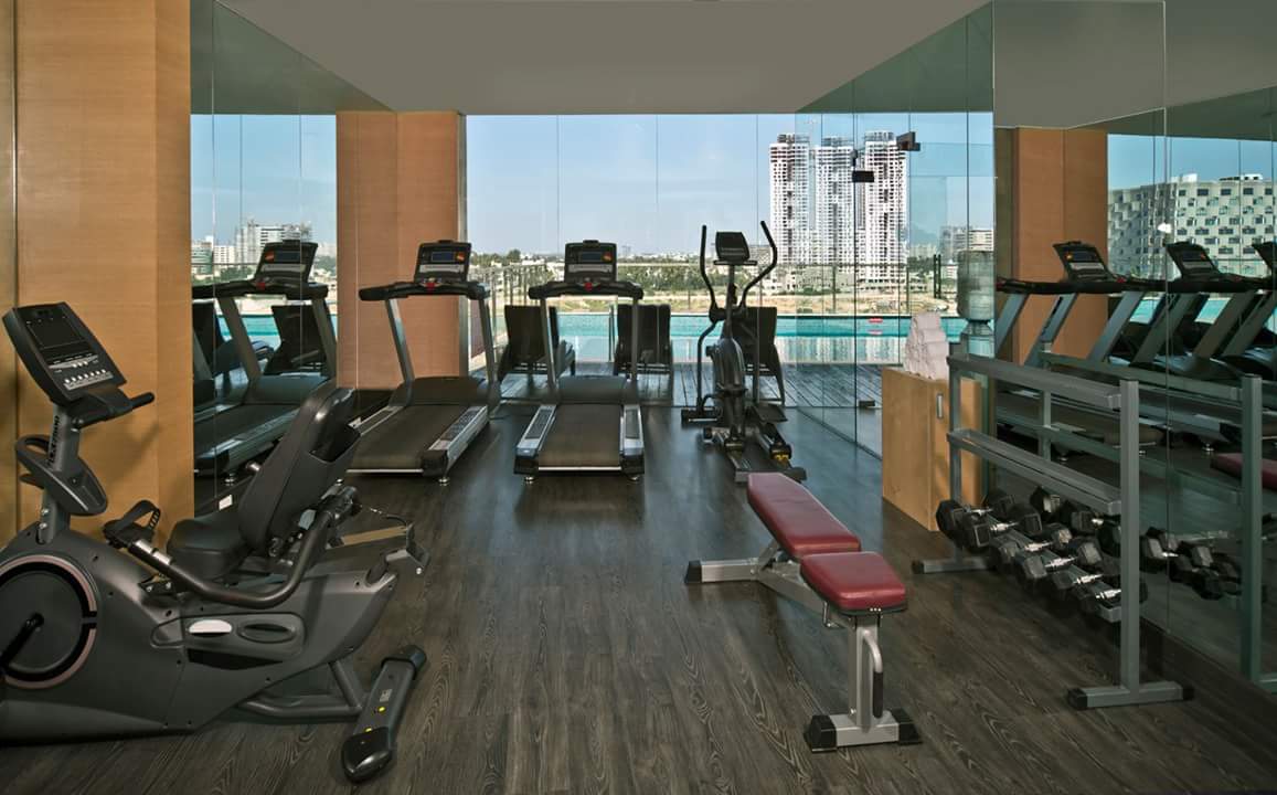 Hardwood flooring gym with stationery glass panel by R. Gautam Jain Modern | Interior Design Photos & Ideas
