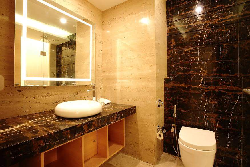 Brown Tiled Bathroom by R. Gautam Jain Bathroom Modern | Interior Design Photos & Ideas