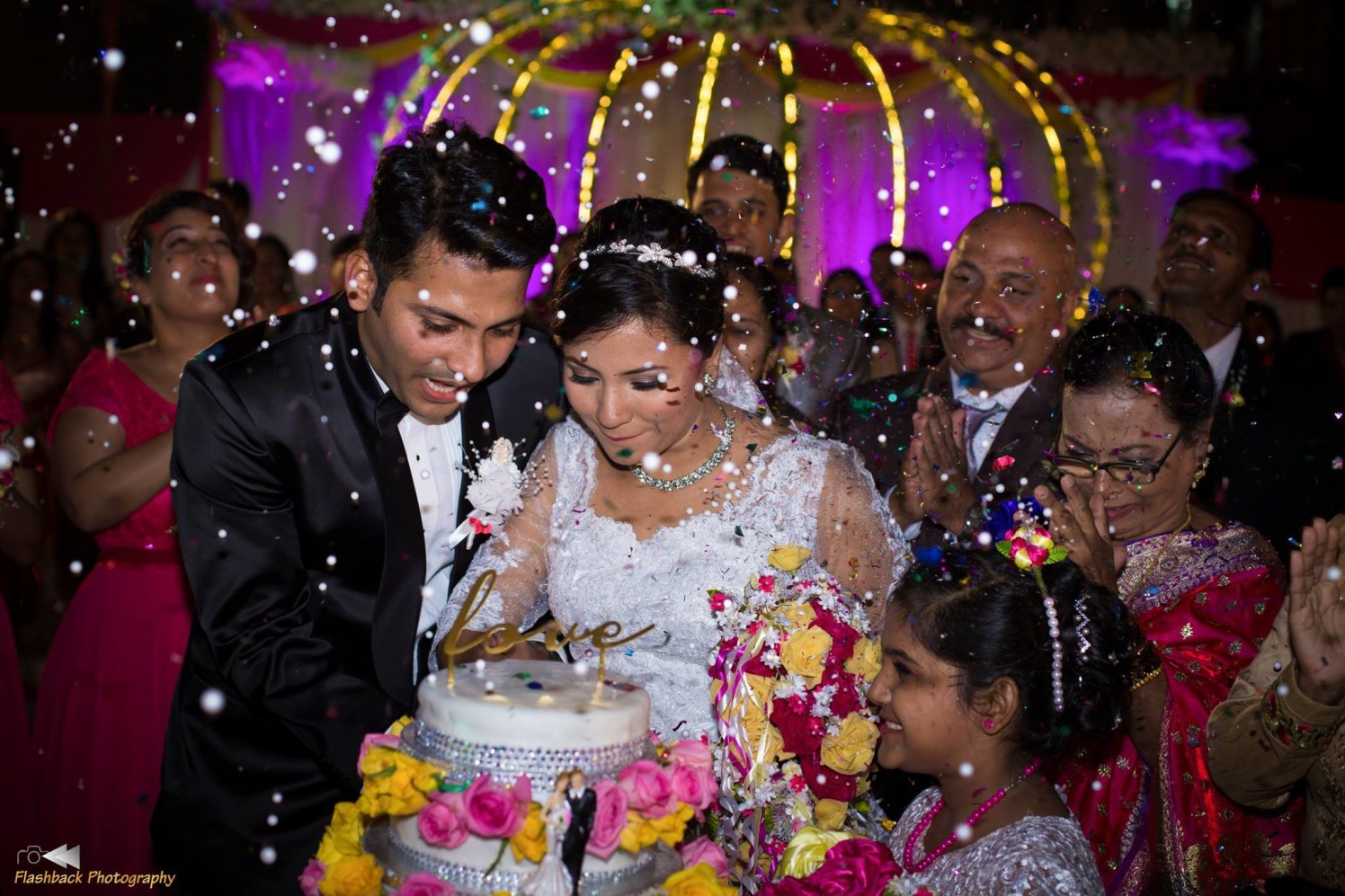 Christian Bride and Groom Cutting Their Wedding Cake by Lloyd Bangera Wedding-photography | Weddings Photos & Ideas