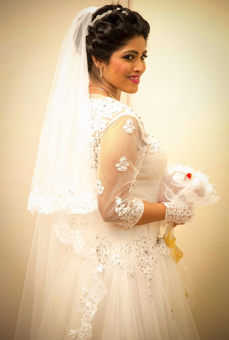 Bride Wearing Exquisite White Net Gown by Lloyd Bangera Wedding-dresses | Weddings Photos & Ideas