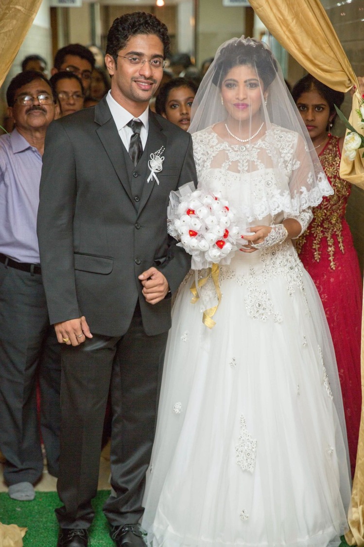 Christian Bride and Groom Wearing Elegant Formal Wear by Lloyd Bangera Wedding-photography Groom-wear-and-accessories Wedding-dresses | Weddings Photos & Ideas