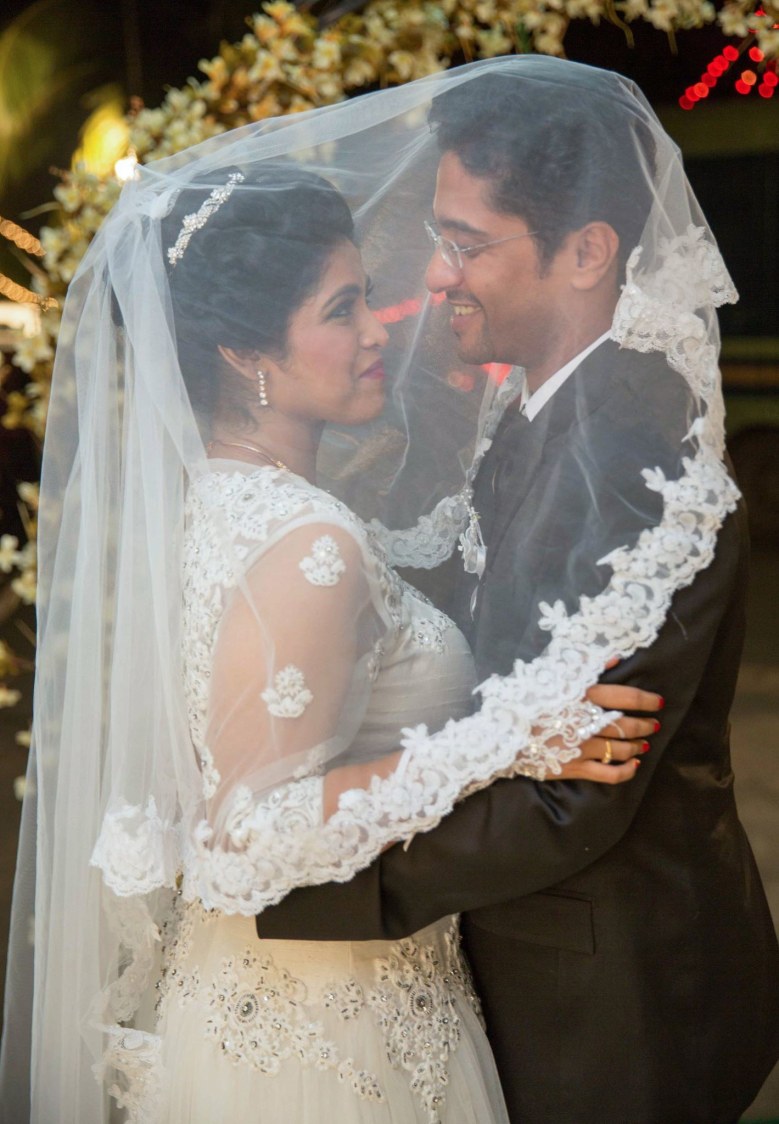 Christian Bride and Groom Striking a Romantic Pose by Lloyd Bangera Wedding-photography | Weddings Photos & Ideas