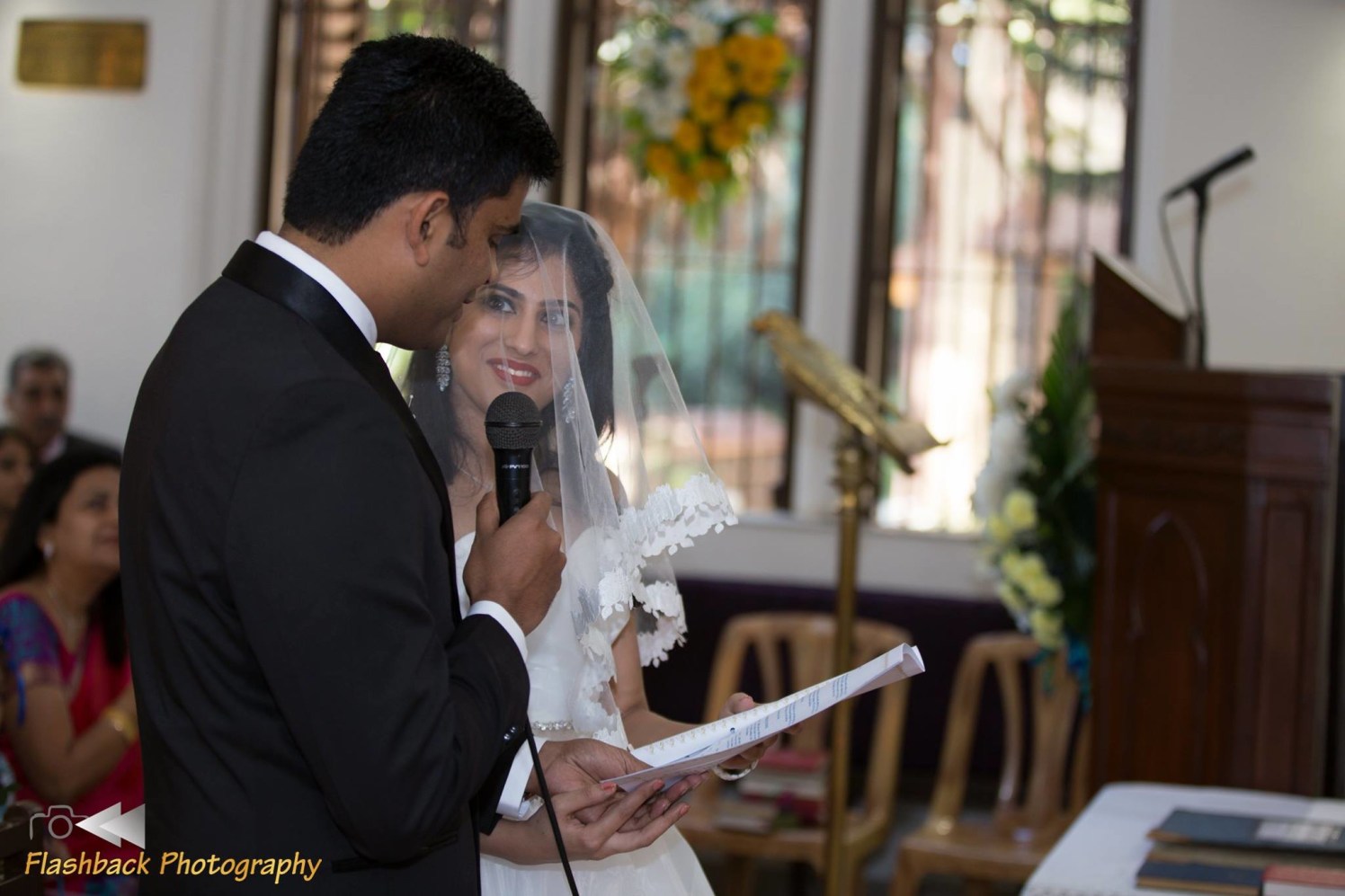 Candid moment of Bride and Groom Reading Their Wedding Vows by Lloyd Bangera Wedding-photography | Weddings Photos & Ideas