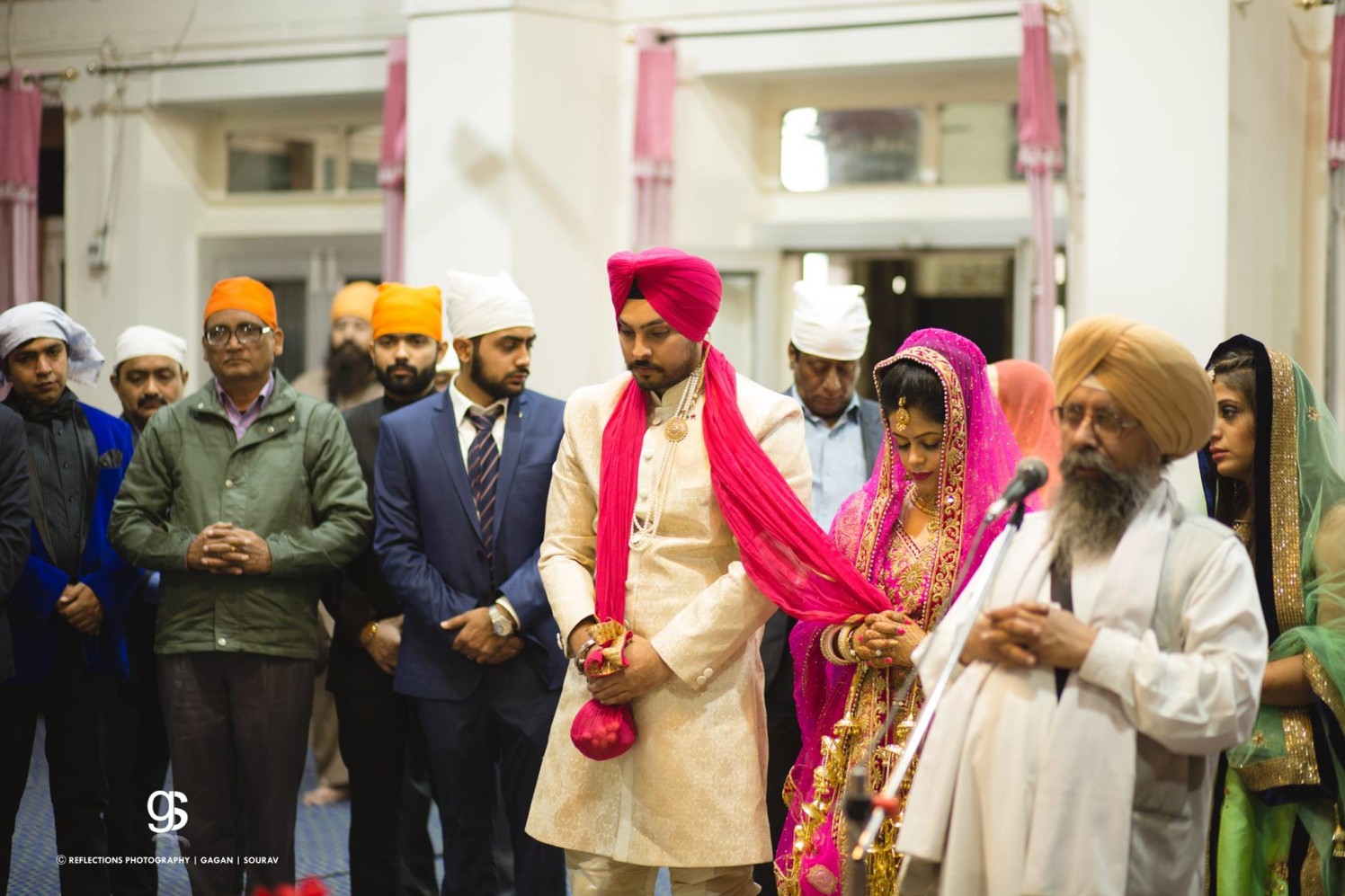Bride and Groom Engrossed in Their Wedding Ceremonies by Sourav Samanta Wedding-photography Groom-wear-and-accessories | Weddings Photos & Ideas