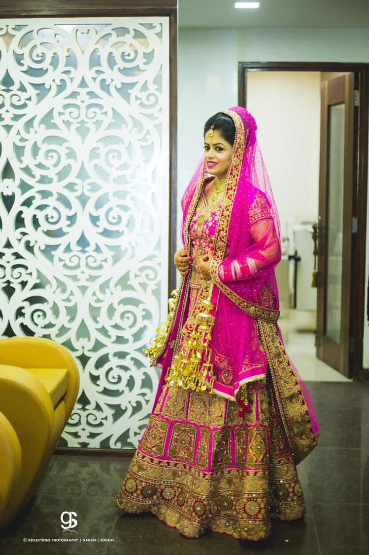 Beautiful Deep Pink Lehenga With Golden Threadwork For Day time Weddings by Sourav Samanta Wedding-photography Wedding-dresses | Weddings Photos & Ideas