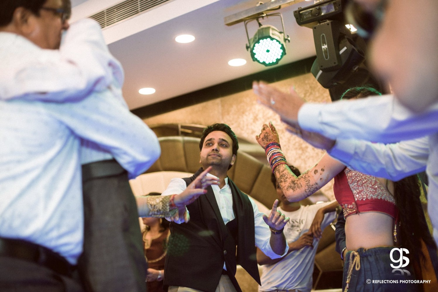 Groovy groom! by Reflections Photography