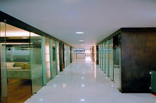 Minimalistic Office Corridor by Irashri Infrastructure Contemporary Minimalistic | Interior Design Photos & Ideas