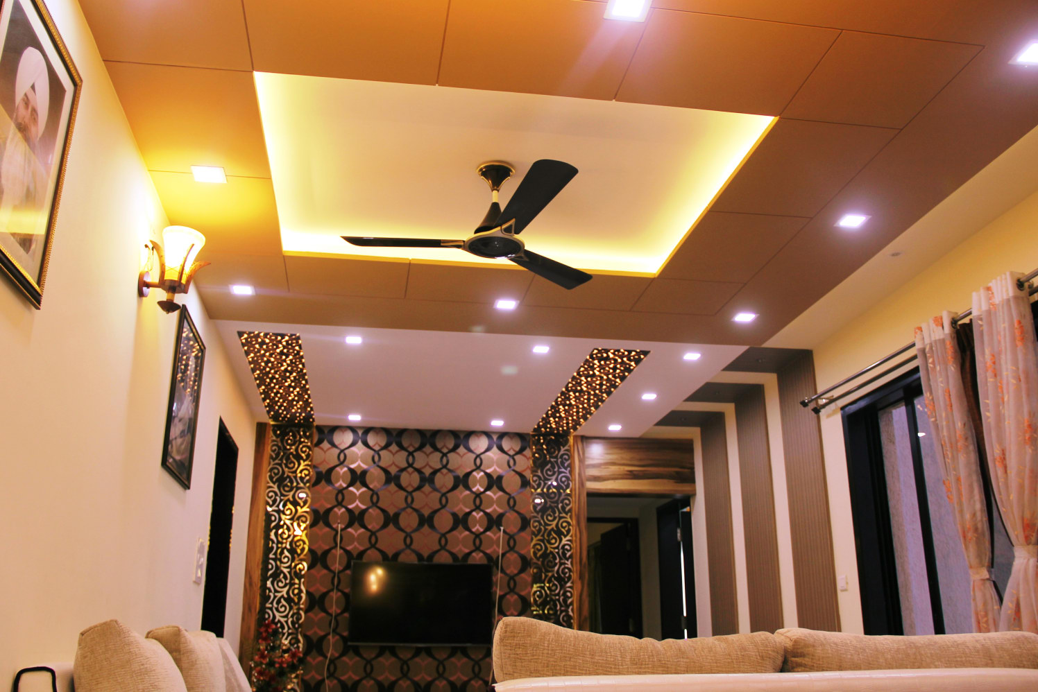 Living Area With Textured Wall And Designer Ceiling by Vibhuti Fotedar Living-room Contemporary | Interior Design Photos & Ideas