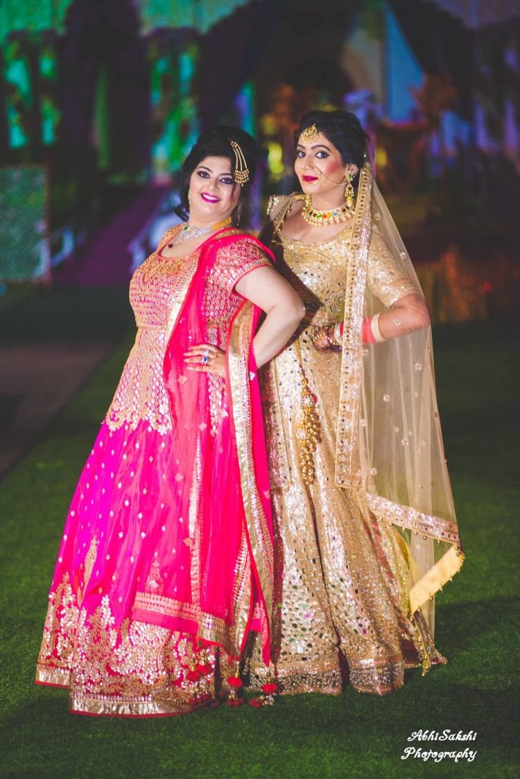 Pretty ladies posing by AbhiSakshi Photography Wedding-photography | Weddings Photos & Ideas