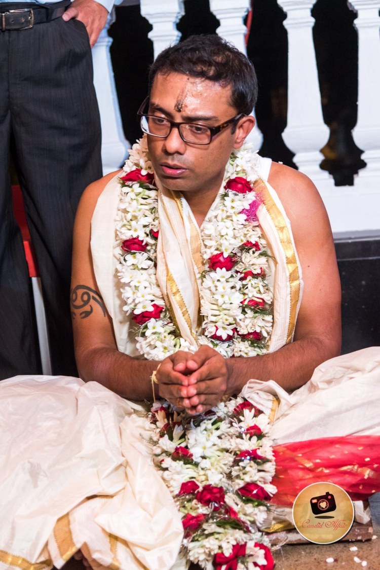 Groom Performing Wedding Rituals by Candid Affair Wedding-photography | Weddings Photos & Ideas