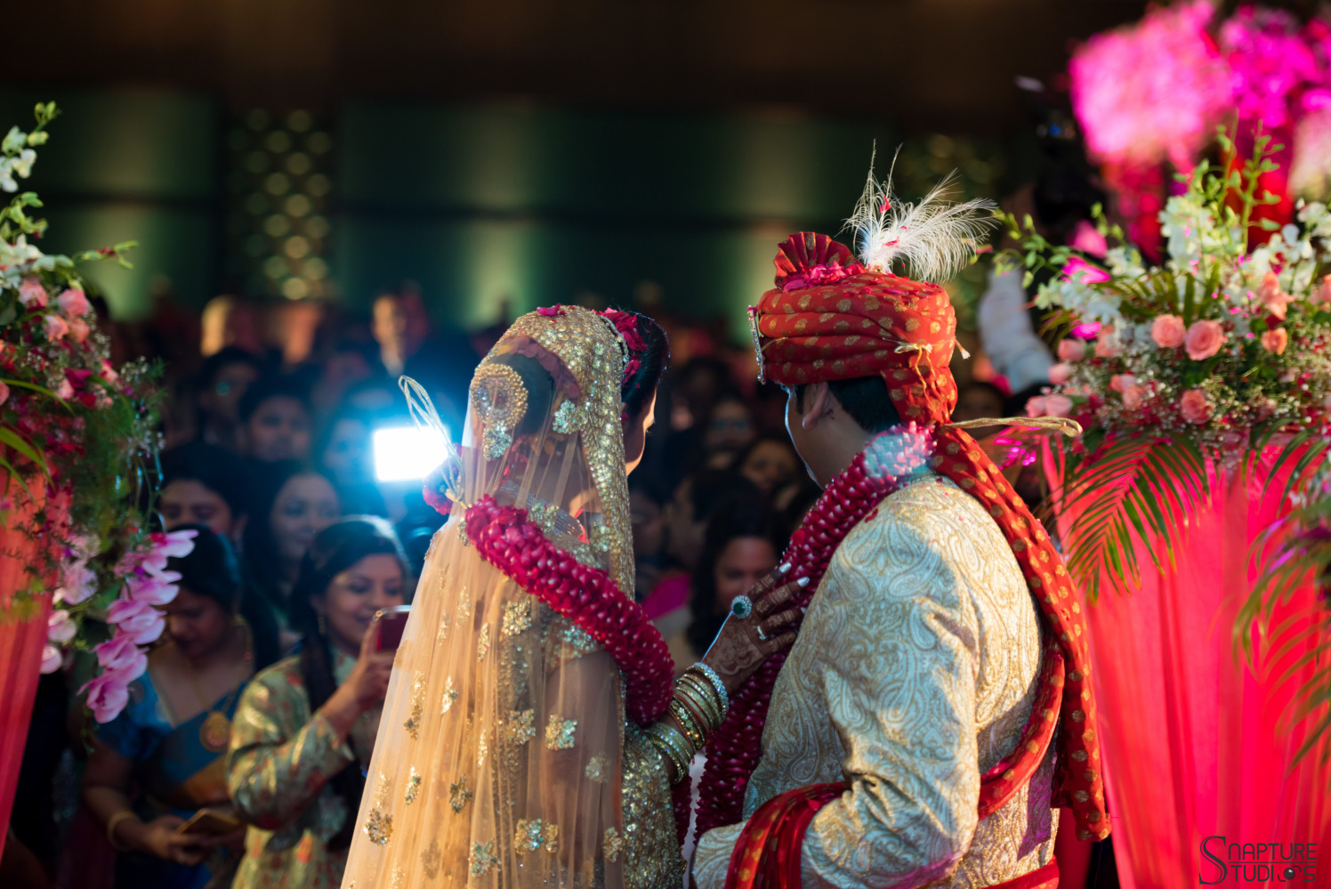 Indian Bride And Groom During Jai Maala by Snapture Studios Wedding-photography | Weddings Photos & Ideas