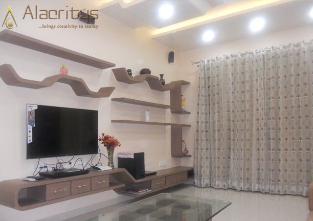 Living Room with Tv Unit And Brown Glossy Display Unit by Trupti Ladda Living-room Minimalistic | Interior Design Photos & Ideas