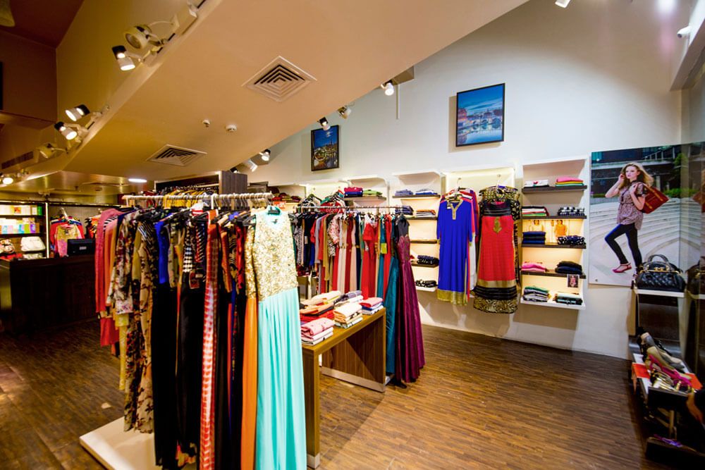 Traditional Clothing Showroom with Wood Flooring and False Ceiling by Trupti Ladda Contemporary | Interior Design Photos & Ideas