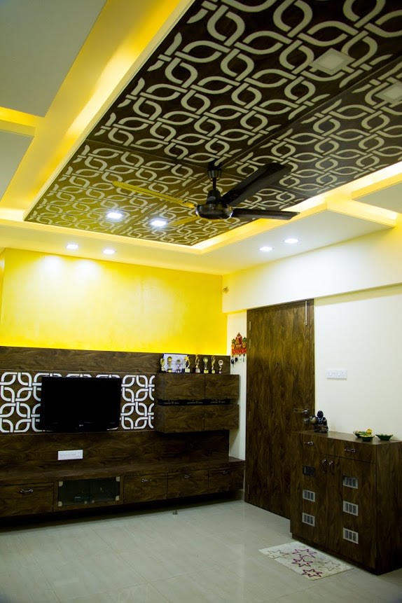 Spacious Living Room with interlocked Patterned Ceiling and wooden Display Unit by Trupti Ladda Living-room Modern | Interior Design Photos & Ideas