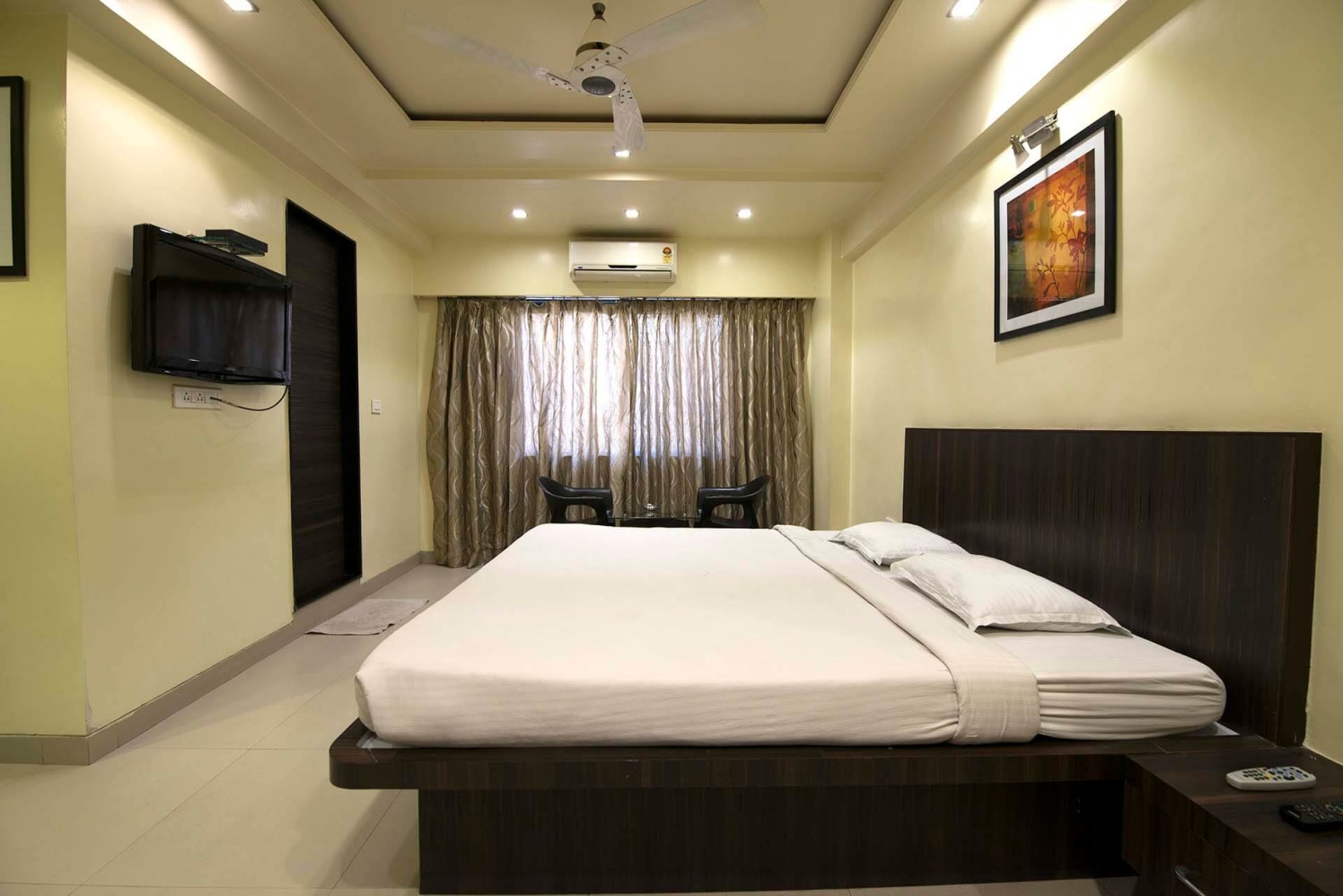 Simple Bedroom with Wooden Finished Queen Size Bed and Marble Flooring by Trupti Ladda Bedroom Minimalistic | Interior Design Photos & Ideas